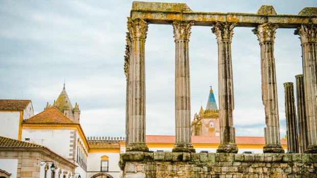 The columns of the Roman temple, the cathedral of Evora, rear, and the Museu de Evora, left.