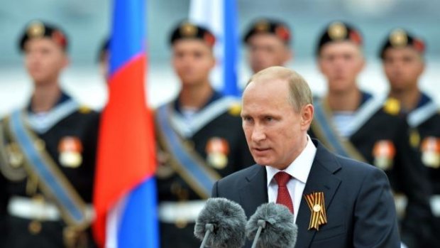 Patriotic speech ... Russian President Vladimir Putin speaks during his visit to the Crimean port of Sevastopol. Authorities in Kiev said Putin's visit to Crimea is a "flagrant violation" of Ukraine's sovereignty.