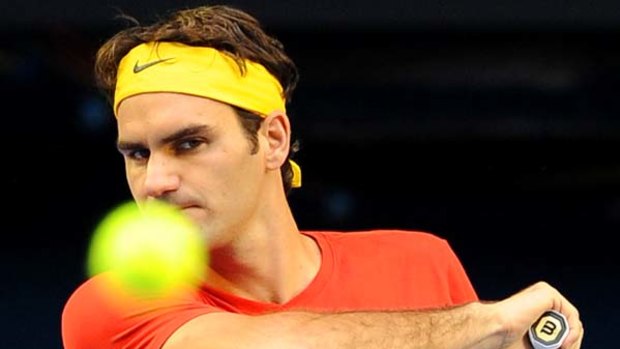 Roger Federer practices for the upcoming Australian Open.