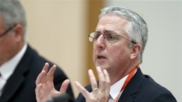 Facing massive cuts ... ABC Managing Director Mark Scott appears before the Senate Environment and Communications Legislation Committee at Parliament House in Canberra.