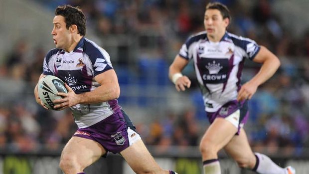 Off and running: Storm's Cooper Cronk sets sail.
