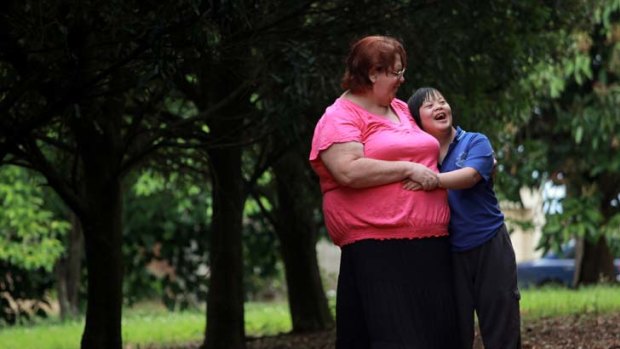 Love to share &#8230; Janet Hughes with her adopted daughter Anna, 14. Future adoptive parents will miss out on the $16,000 allowance for carers who adopt foster children.