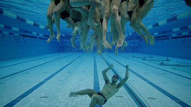 In at the deep end ... members of the Paralympic swim team in the pool at the Australian Institute of Sport in Canberra.