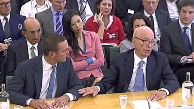 James and Rupert Murdoch appear before a parliamentary committee on phone hacking.