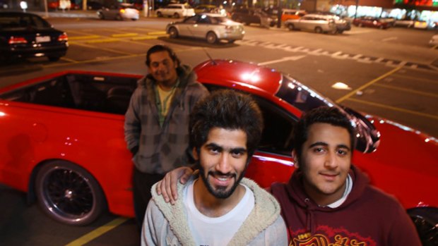 Car enthusiasts Muath Mohamed Almarashda (front left), the owner of the  Holden ute, and his mate Hamad Al Mazmi (right).