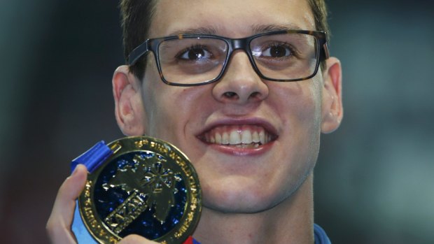 Golden double: not to be outdone, Mitch Larkin also claimed gold in the men's 100m backstroke event.