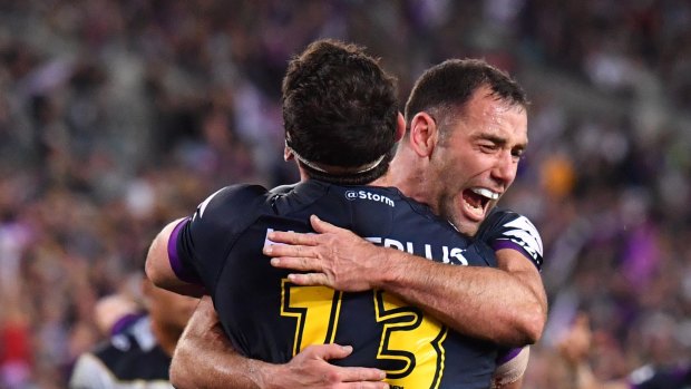 Storm stars Dale Finucane and Cameron Smith celebrate after a deft pass put Finucane over the try line.