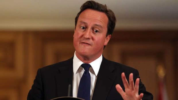Tough talk ... Prime Minister David Cameron holds a press conference at 10 Downing Street.