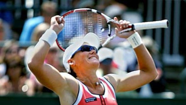 Samantha Stosur celebrates after winning the singles final at the Family Circle Cup Tennis Tournament in Charleston, South Carolina.