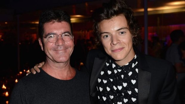 Tough line: Simon Cowell (pictured with Harry Styles) says a discerning eye has gained him success with acts such as One Direction.