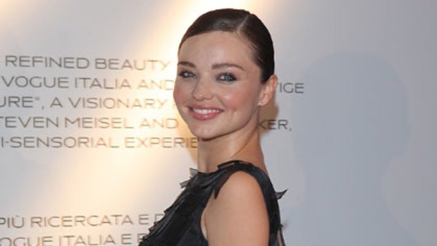 Miranda Kerr shows off her baby bump in September.