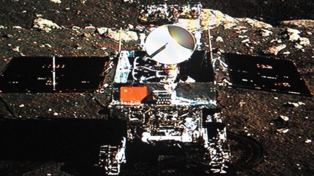 A photo of China's Jade Rabbit moon rover taken by the Chang'e-3 probe lander on December 15, 2013.  Jade Rabbit has sent back photos from the moon after the first lunar soft landing in nearly four decades, was declared a success. 
