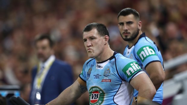 Changing of the guard: Paul Gallen and Jack Bird watch on from the bench during Origin II.