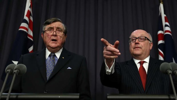 Concern over former Australian jihadists: Attorney-General Senator George Brandis (right) and Director-General of Security, David Irvine.