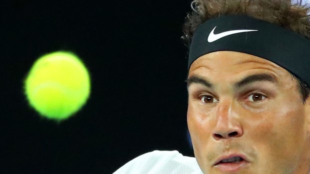 Rafael Nadal is a picture of concentration during his quarter-final against Milos Raonic on Wednesday. 