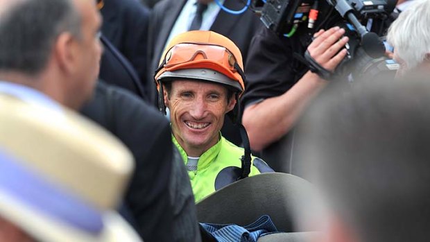 Damien Oliver &#8230; after taking the Thousand Guineas.