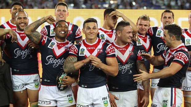 The Sydney Roosters celebrate after defeating the Manly Sea Eagles.