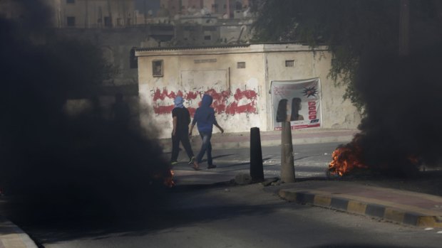Bahraini youths burn tires on a third straight day of protests against Saudi Arabia's execution of Saudi Shiite cleric Sheikh Nimr al-Nimr.