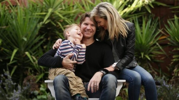 Simon Meredith with wife Leiza and son Hamish. 