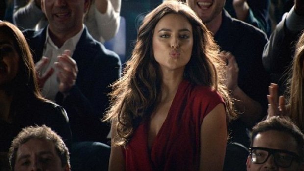 Irina Shayk blows a kiss to her boyfriend Cristiano Ronaldo in a scene from a Nike ad.