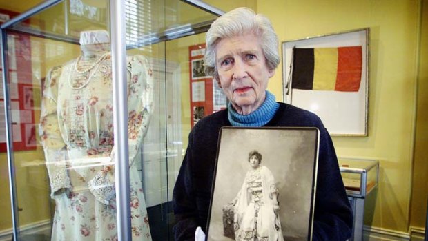 Lady Vestey holding a picture of her grandmother Dame Nellie Melba.