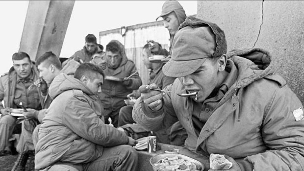 Worth fighting for ... Argentine soldiers eat at a former Royal Marines base in 1982.