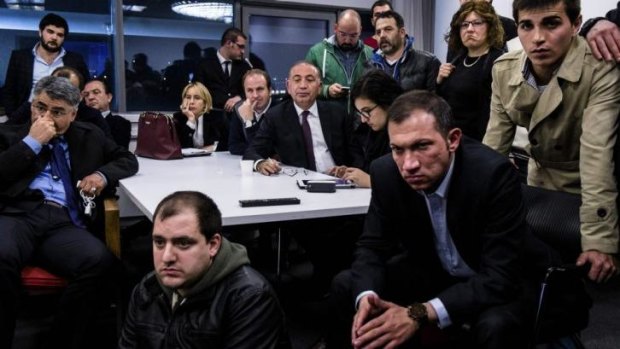 Grim tidings: Members of the opposition Republican People's Party (CHP) watch the election results from their Ankara HQ.