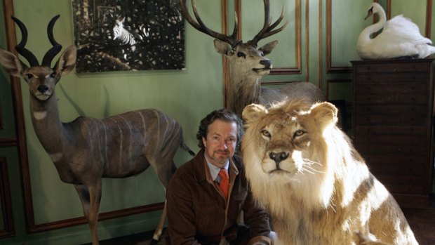 Owner Louis Albert De Broglie is seen with stuffed animals in the Deyrolle taxidermy shop in Paris in 2008.