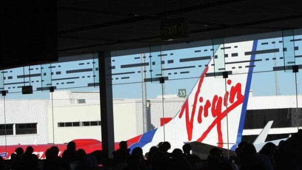 The deal frees funds to expand the airline's frequent flyer program, Virgin says. Analysts believe the money will be needed to fund operating losses after Virgin took full control of Tigerair.