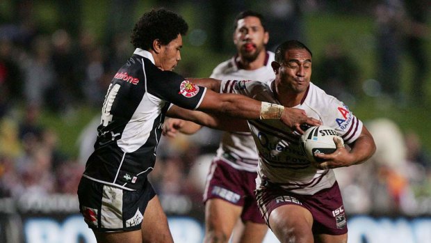 Manly's Joe Galuvao is tackled.