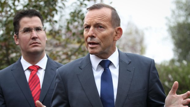 At odds? Senator Zed Seselja, left, and Prime Minister Tony Abbott.