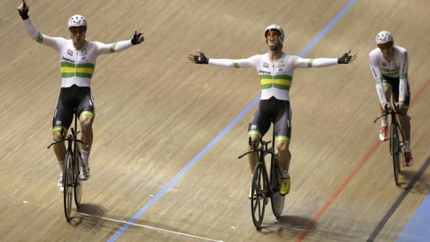 Australia celebrate winning the gold medal in men's team pursuit in Cali, Colombia.