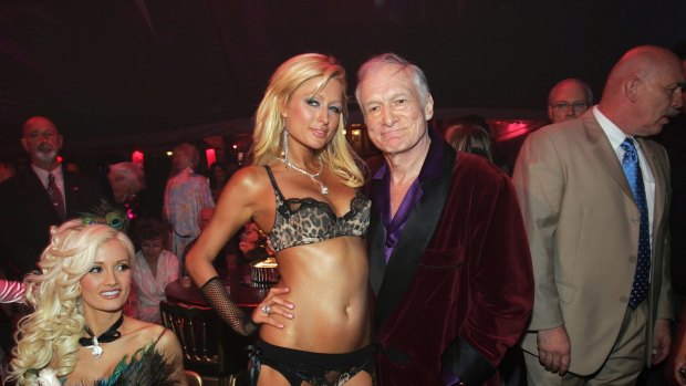 Hugh Hefner pictured with Paris Hilton during his 80th birthday party celebration at the Playboy Mansion.