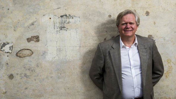 Nobel Prize winner Brian Schmidt, at the site of the old 50" reflector telescope at Mt Stromlo that was burnt out in 2003.