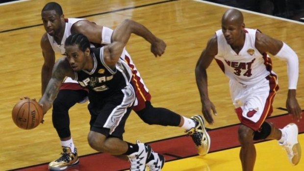 Spurs forward Kawhi Leonard takes off against Miami in game four of the NBA Finals.