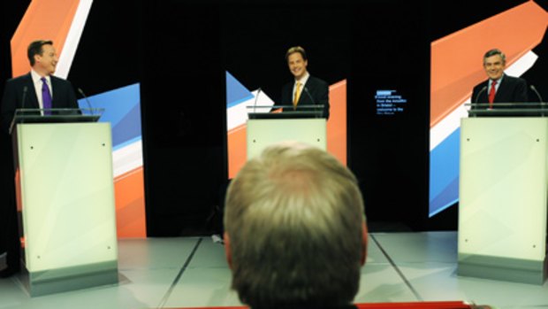 Three's a crowd... Nick Clegg takes centre stage on Thursday at the second televised debate with the Conservative leader, David Cameron, left, and the Prime Minister, Gordon Brown.
