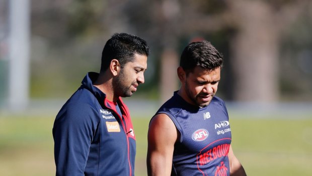 Neville Jetta (right) limped from the training track on Tuesday.