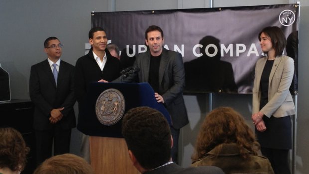Creating a local network ... Urban Compass co-founder Dr Ori Allon, centre, launches his latest venture in New York.