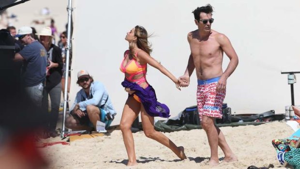 Sofia Vergara and co-star Ty Burrell on the set of Modern Family shooting on Bondi Beach.