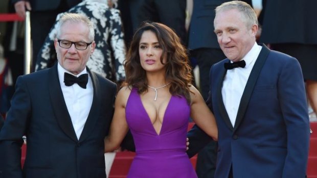 Salma Hayek with the General Delegate of the Cannes Film Festival Thierry Fremaux (left) and her husband Francois-Henri Pinault.