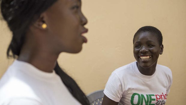 Jacklen Gai Kuai, 25 years old (right) visits Juba with her cousin Nyalalat Malual for the first time. Jacklen came to South Sudan to visit her father who has returned to participate in the independence anniversary celebrations.