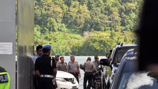 Police oversee preparations for the executions in Cilacap, the closest town to Nusakambangan where the prisoners will be shot.

