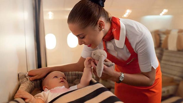 Etihad Airways is training some of its flight attendants to be 'flying nannies' on board flights.