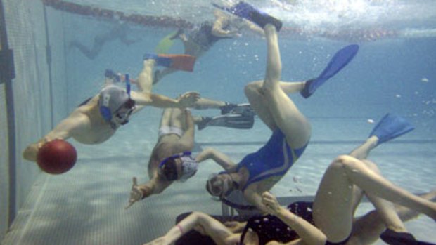 The game they play at the bottom of a swimming pool ...  underwater rugby began in Germany several decades ago, as a form of fitness training for divers.