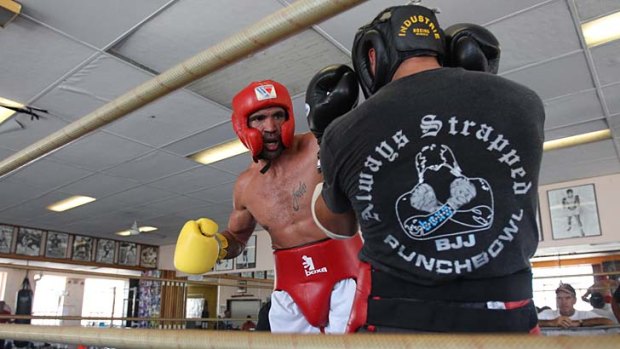 Pumped up &#8230; Mundine sparring at his father's Redfern gym ahead of next week's world title bout with Daniel Geale.