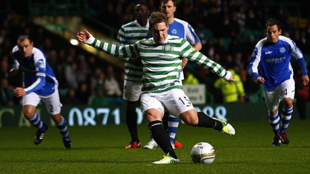 Kris Commons scores from the spot.