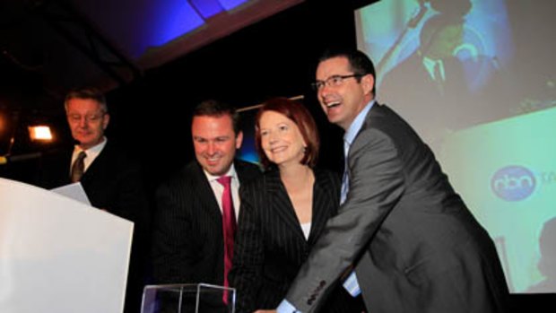 Julia Gillard launched the National Broadband Network with Communications Minister Stephen Conroy and Tasmanian Premier David Bartlett.