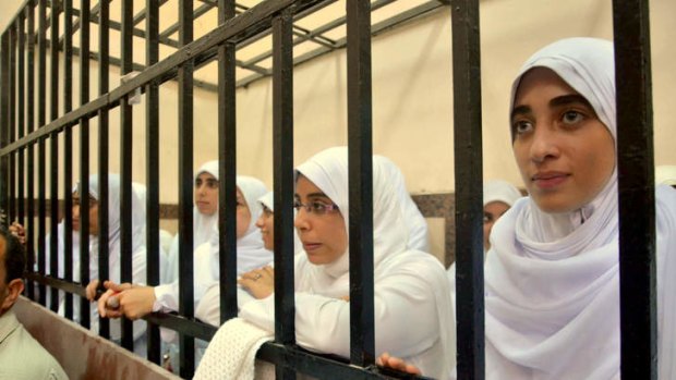 An Egyptian court has handed down heavy sentences of 11 years in prison to 21 female supporters of the ousted Islamist president, many of them juveniles, for holding a protest.