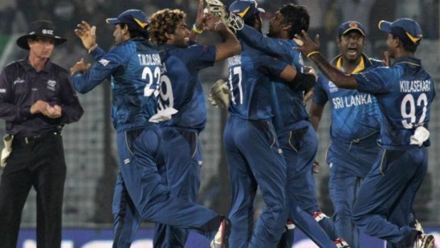 Sri Lanka's player celebrate a five-run win over South Africa.