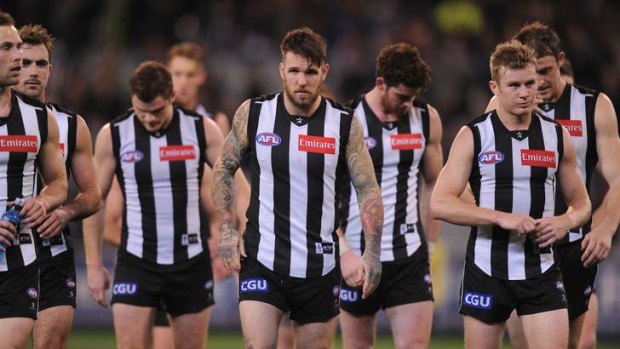 Collingwood walks off  after the loss to Port Adelaide at the MCG.